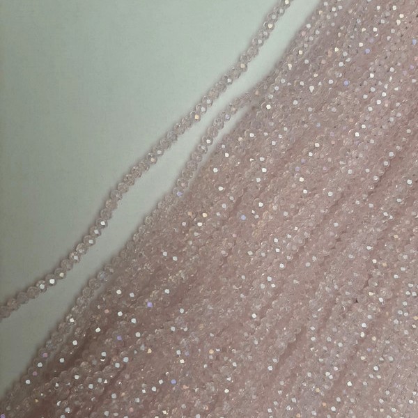 Rosa facettierte Perlen aus tschechischem Kristall, rosafarbene transparente Rondell-Perlen, mit petrolfarbener Irisierung, Durchmesser ca. 3,5 × 3 mm, Länge ca. 39 mm, auf Faden