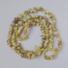 Perlen aus Grossular (grüner Granat) Naturstein-Splitter, Durchmesser 8×4 mm ±, Länge ca. 80 cm ±, auf Faden