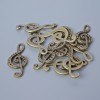 Schmuckzubehör Anhänger 'Geigenschlüssel', Durchmesser 33×14,5 mm, Lochdurchmesser 5,5×2 mm, Verpackung 11 Stück ±, bronzefarbenes Metall