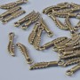 Anhänger „Feder“, bronzefarbenes Metall, Abmessungen 16 × 3,5 mm, Lochdurchmesser 1,4 mm, Verpackung 33 Stück ±