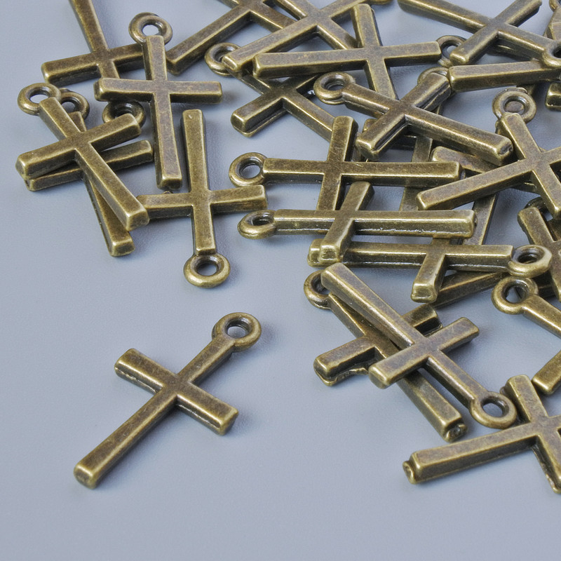 Anhänger 'Kreuz' in bronzefarbenem Finish, Abmessungen 18×10 mm, Lochdurchmesser 1,3 mm, Verpackung ca. 30 Stück