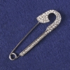 Nadelbrosche mit weißen Strasssteinen, silberfarbenes Metall 71×19 mm+