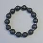 Schungit-Armband (künstlich) glatte Kugeln, Durchmesser ca. 12 mm, Elastikband, Länge ca. 18 cm, mit Hämatit-Einsätzen