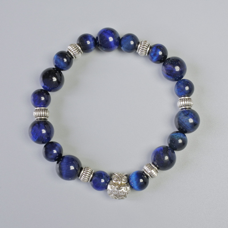Armband aus blauem Katzenauge, glatte Perlen, Durchmesser ca. 10,5 mm bzw. 8,5 mm ± (Stretch), Länge ca. 18 cm ± mit Metalleinlagen