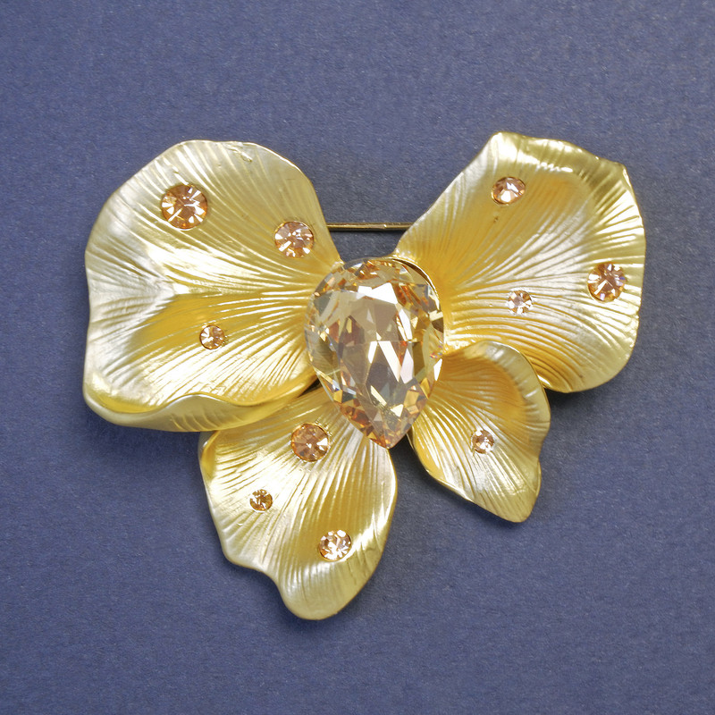 Schleifenbrosche mit großem gelben Kristall 53×48 mm ± goldfarbenem Metall