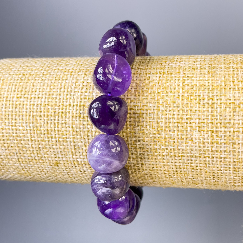 Armband aus Amethyst, facettierte Perlen, Durchmesser ca. 13×12 mm, Länge ca. 18 cm, elastisch