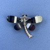 Schmetterlingsbrosche «Schmetterling» mit weißen und grauen Strasssteinen, Metall in Schwarz-Gold-Ton, Durchmesser ca. 40 mm, Länge ca. 30 mm