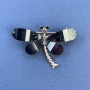 Schmetterlingsbrosche «Schmetterling» mit weißen und grauen Strasssteinen, Metall in Schwarz-Gold-Ton, Durchmesser ca. 40 mm, Länge ca. 30 mm