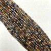 Petersit-Perlen, facettierte Würfel, Durchmesser ca. 3 mm, Länge 39 cm