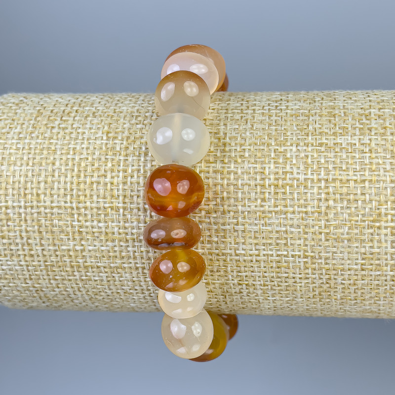 Karneol-Armband, facettierte Perlen, Durchmesser ca. 12 × 9–11 mm, Länge ca. 18 cm, Stretch