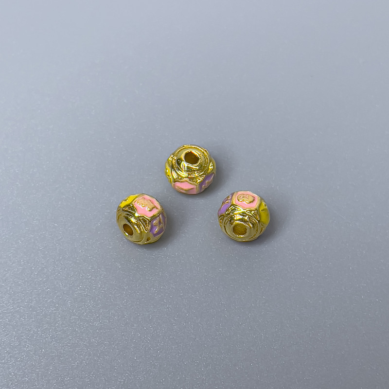 Cloisonsperle Rondell rosa-gelb-lila emailliert, Durchmesser 6×5 mm, Loch Ø 1 mm, goldfarbener Metallton, 1 Stück