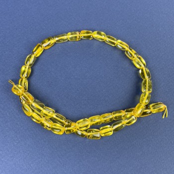 Bernstein facettierte Perlen 10×7 mm, auf einer Schnur, Länge ca. 39 cm