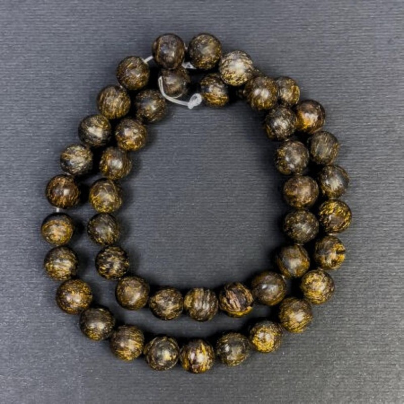 Bronzit-Natursteinperlen glatt 8,5 mm (+-), Bohrung 1,5 mm (+-), Länge 38 cm (+-)