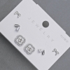 Ohrstecker in Kleeblattform aus silberfarbenem Metall mit weißen Strasssteinen, 10 mm+