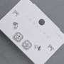 Ohrstecker in Kleeblattform aus silberfarbenem Metall mit weißen Strasssteinen, 10 mm+