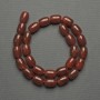 Karneol-Barrelperlen, Maße 14×10 mm ±, auf einem Faden, Länge ca. 39 cm+