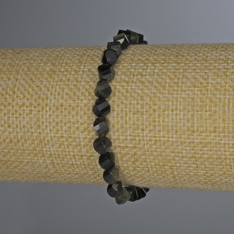 Stretcharmband aus Sonnen-Obsidian, facettierte Rhombus-Perlen, Durchmesser 6×5 mm, Länge ca. 18 cm