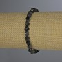 Stretcharmband aus Sonnen-Obsidian, facettierte Rhombus-Perlen, Durchmesser 6×5 mm, Länge ca. 18 cm