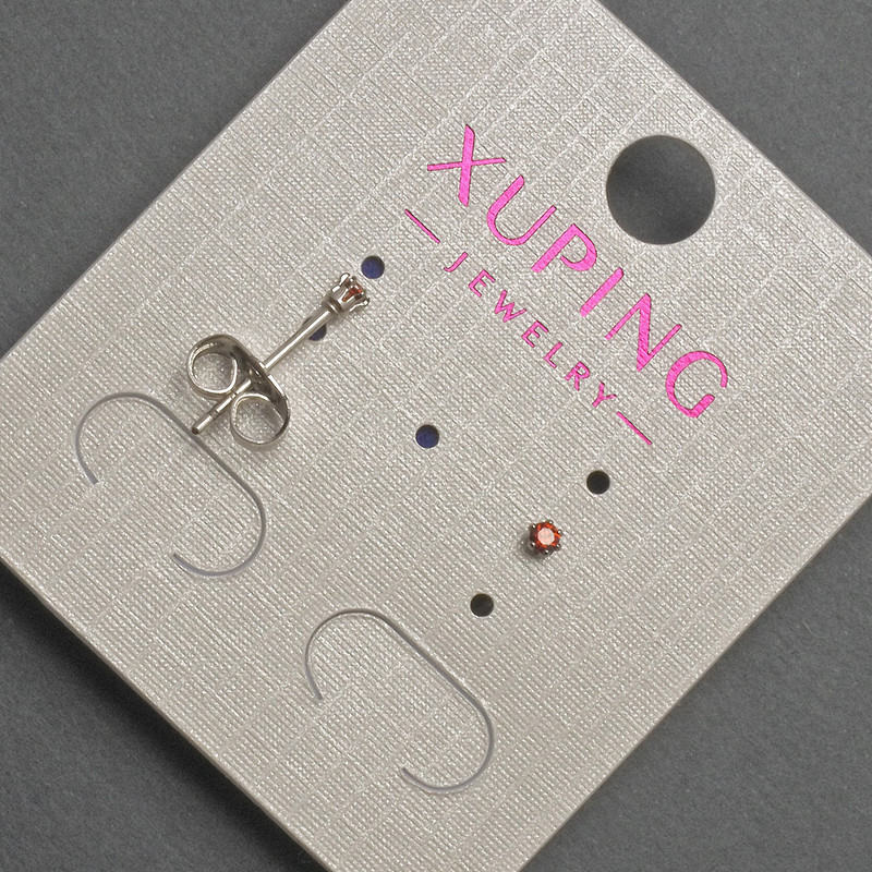 Xuping-Ohrstecker mit rotem Kristall, Durchmesser ca. 2 mm, rhodiniert