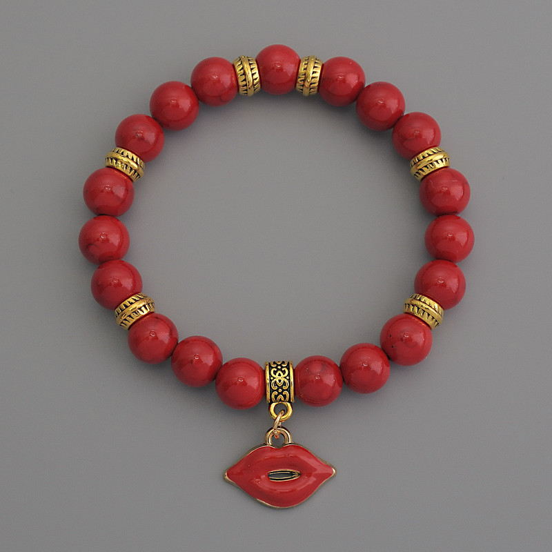 Armband aus künstlicher Koralle, glatte Kugeln, Durchmesser 8 mm ±, mit metallischen Einsätzen, Länge 18 cm, Stretcharmband