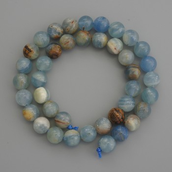 Calcit-Perlen blau, glatte Kugeln 10 mm, auf einer Schnur, Länge ca. 39 cm