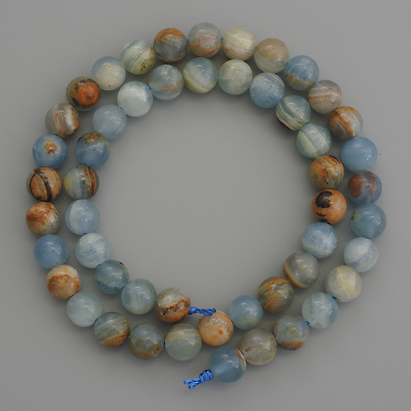 Kalzit-Perlen hellblau, glatte Kugeln 8 mm ±, auf Schnur, Länge ca. 39 cm