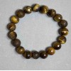 Tigerauge-Armband, facettierte Kugeln, Durchmesser ca. 10 mm+-, Länge ca. 18 mm+- Stretch