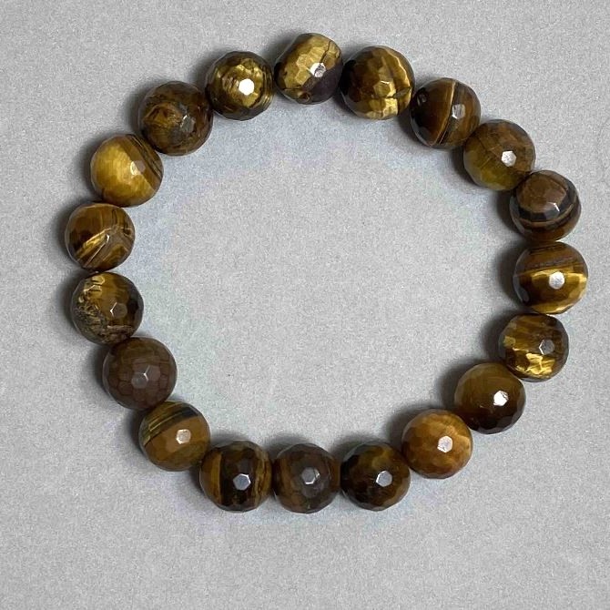 Tigerauge-Armband, facettierte Kugeln, Durchmesser ca. 10 mm+-, Länge ca. 18 mm+- Stretch