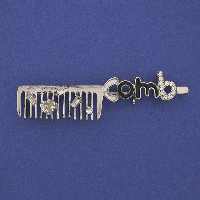 Brosche „Kammform“ mit weißen Strasssteinen, silberfarbenes Metall, 60 × 12 mm+