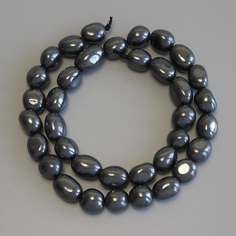 Facettierte Hämatit-Perlen, Ø 10–12 × 8,5–9,5 mm, Länge ca. 39 cm