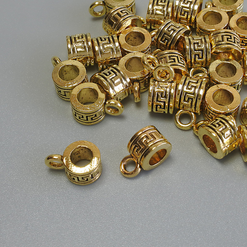 Anhängeröse, goldfarben, Maße 6,5 × 5 × 9,5 mm, Bohrungen Ø 4 mm und Ø 2 mm, Verpackung 20 g, 29 Stück