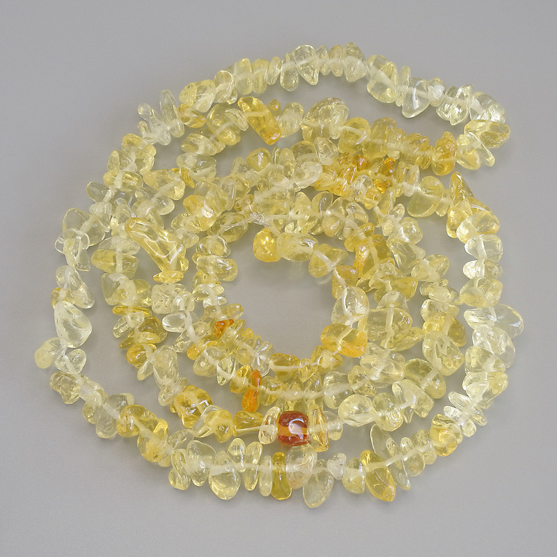 Zitrin-Chips-Perlen, Durchmesser 6-11×2-4 mm, 5 mm ±, Länge ca. 80 cm auf Nylonfaden