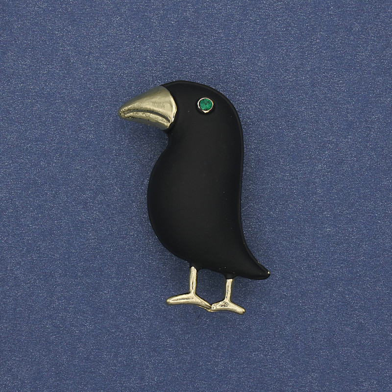 Brosche 'Vogel' – schwarzer, matter Farbton, grüner Strassstein, goldfarbenes Metall, 36×21 mm