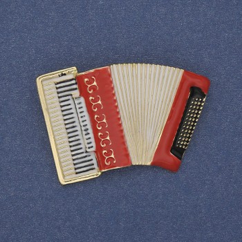 Brosche 'Akkordeon' rot-weiße Emaille, goldfarbenes Metall 43×28 mm+