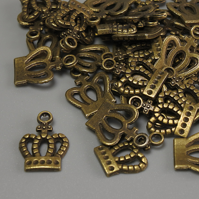 Schmuckzubehör Anhänger Krone, bronzefarbener Metallton, Abmessungen 15×10×1 mm ± Loch Ø ca. 2 mm ± Verpackung 20 g (~36 Stück)