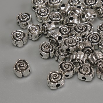 Blüten-Perleinsatz, silberfarbener Metallton, Maße 6×4 mm, Loch Ø ca. 1,7 mm, Verpackung 20 g (~37 Stück)