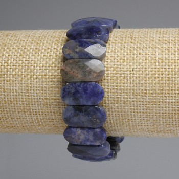 Armband aus Sodalit, facettierte abgerundete Glieder, Durchmesser ca. 20×10 mm, Länge ca. 18 cm, Elastikband
