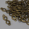 Verbindungsstück Unendlichkeit in bronzefarbenem Metall 20×6 mm ± Verpackung 29 Stück+