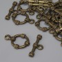 Bronzefarbener Toggle-Verschluss, Ø ca. 19,5 × 3,5 mm; Ring Ø ca. 14 mm; Loch Ø ca. 9 mm; Bronze-Finish; 11 Stück
