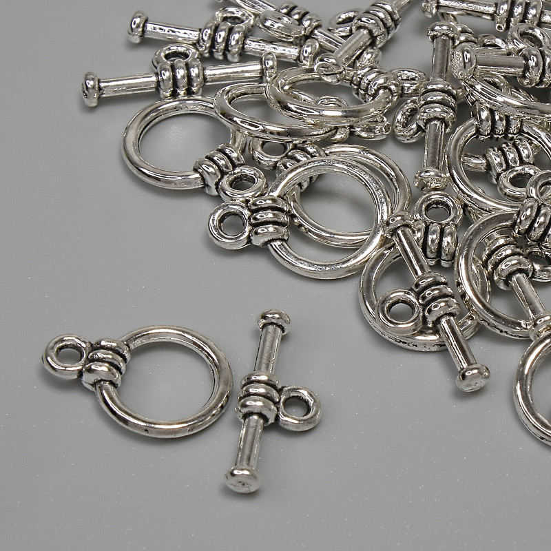 Toggle-Verschluss, Durchmesser 15×3 mm ±, Ringdurchmesser 9,5 mm ±, Lochdurchmesser 7 mm ±, silberfarbener Metallton, facettiert, 15 Stück ±