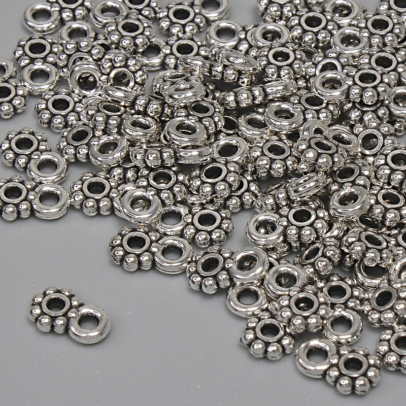 Silberfarbener Anhänger, Durchmesser 7×4,5 mm, Loch in der Öse 1,5 mm, Verpackung 84 Stück+