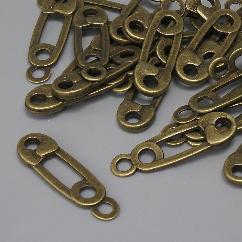 Anhänger 'Nadel' bronzefarben, Durchmesser ca. 23×7 mm, Loch im Ohr ca. 2,2 mm, Verpackung 22 Stück