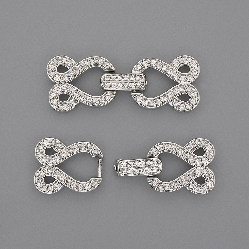 Verschluss für zwei Fäden mit weißen Strasssteinen, Durchmesser 30 × 12 mm, silberfarbener Metallton