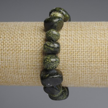 Armband aus Serpentin, facettierte Perlen, Durchmesser 14–17 × 7–10 mm, Länge ca. 18 cm (Stretch)
