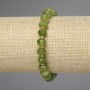 Armband aus facettiertem Jadeit-Rondell, Durchmesser ca. 8×5 mm, 3 mm Glasperlen, Länge ca. 18 cm, Stretch-Armband