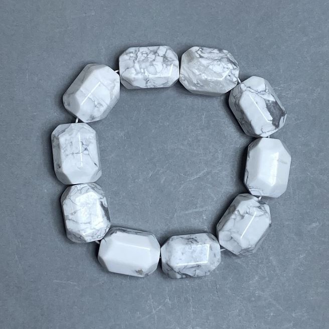 Kaholong-Armband mit facettierten Rondellen, Durchmesser ca. 20 × 15 mm, Länge ca. 18 cm, Stretch