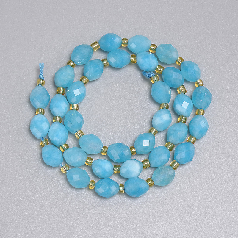 Aquamarin facettierte Reiskornperlen 8×6,5 mm ±, Rocailles 3 mm ±, Länge ca. 36 cm – auf der Schnur