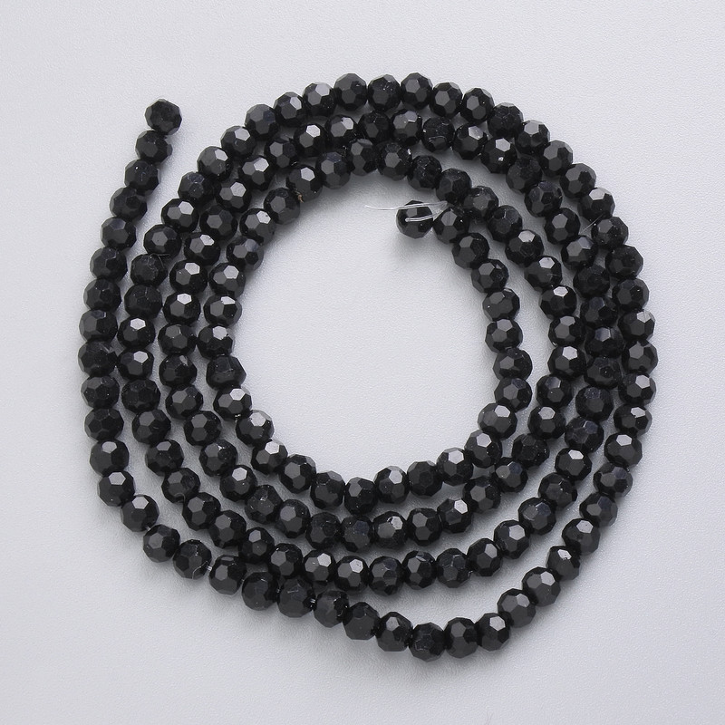 Perlen aus tschechischem Kristall auf Monofilament-Schnur, schwarz matt, facettierte Kugeln, Durchmesser 3,5 mm, Länge ca. 49 cm