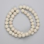 Beige Lava-Perlenkugeln, Durchmesser 8 mm ±, auf einer Schnur, Länge 38 cm+