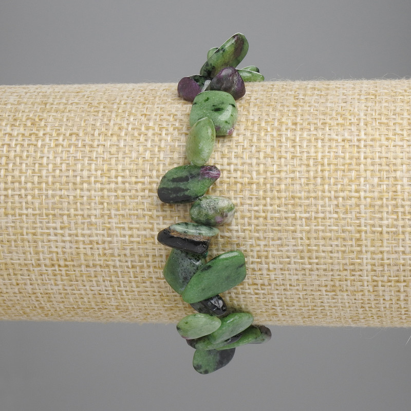 Zoisit-Armband, facettierte Perlen in Schmetterlingsform, Ø 8–16×2–8 mm, Länge ca. 18 cm, Stretcharmband